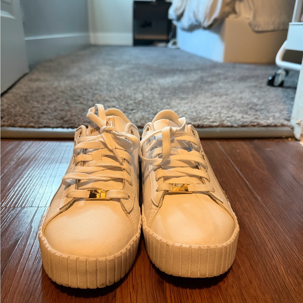Puma Women's Sneakers in White with Gold Accents